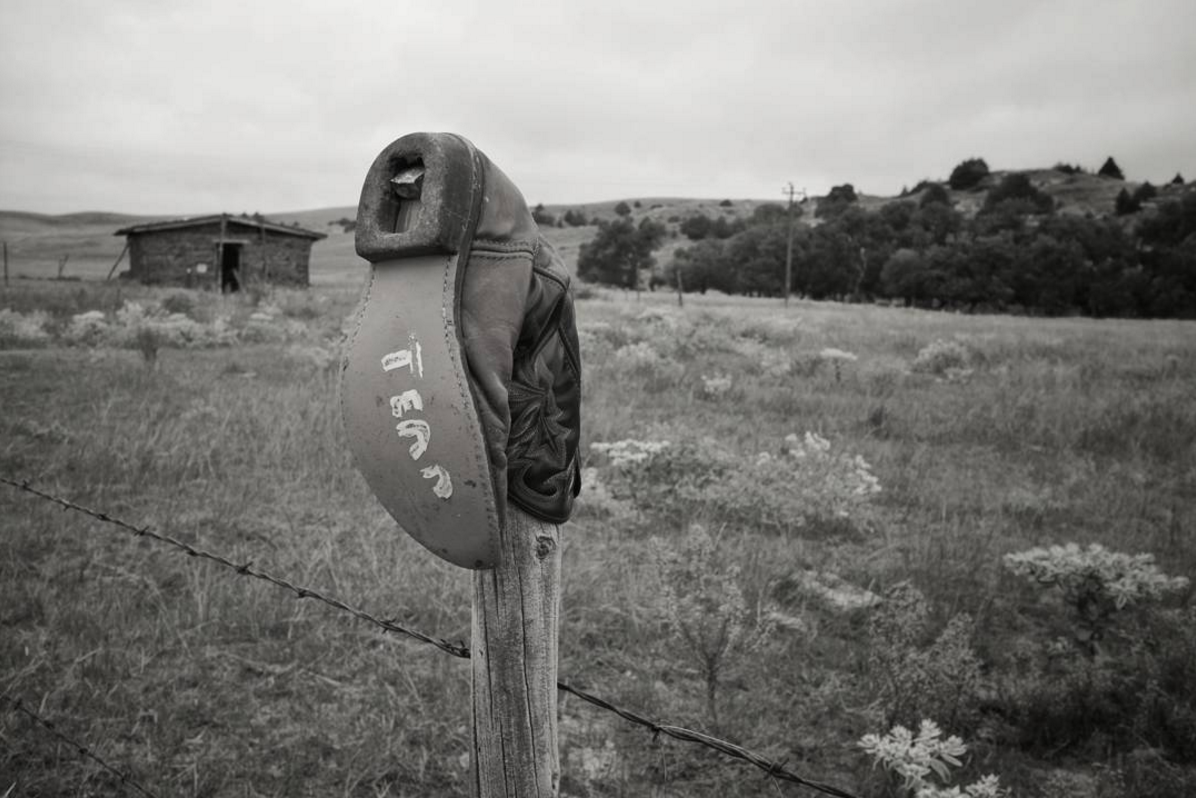 Boots on Fence Posts